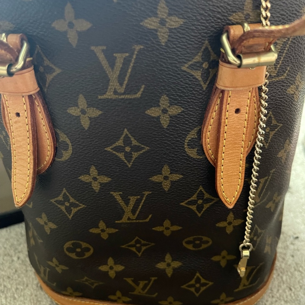Authentic Louis Vuitton vintage bucket bag and matching wallet